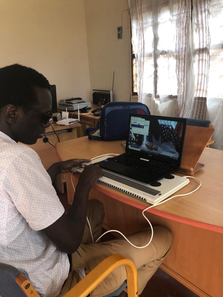 Blind man using a compuer